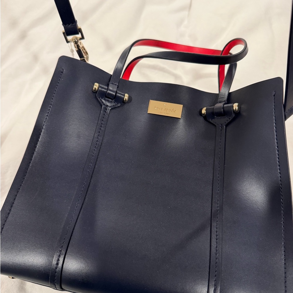 kate spade Black Leather Tote with Red-Trim Handles and Gold Plaque